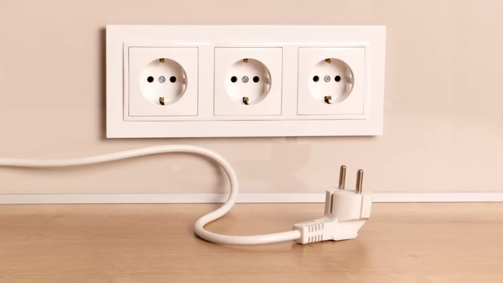 Plug another appliance, like a lamp or a fan, into the same outlet you’re using to charge your phone.