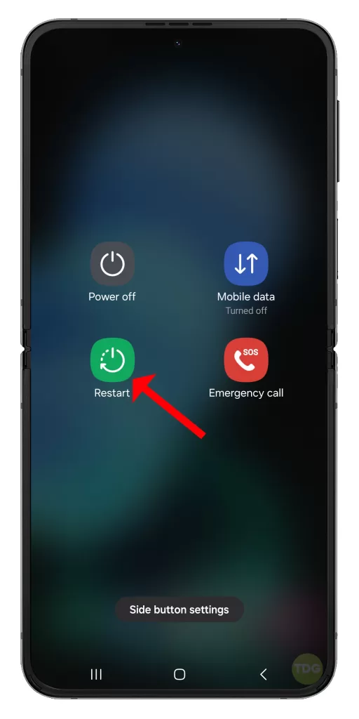 When the Power menu shows, tap on ‘Restart’ and confirm you want to reboot your Galaxy Z Flip 5.